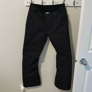 Women’s black TNF snow pants